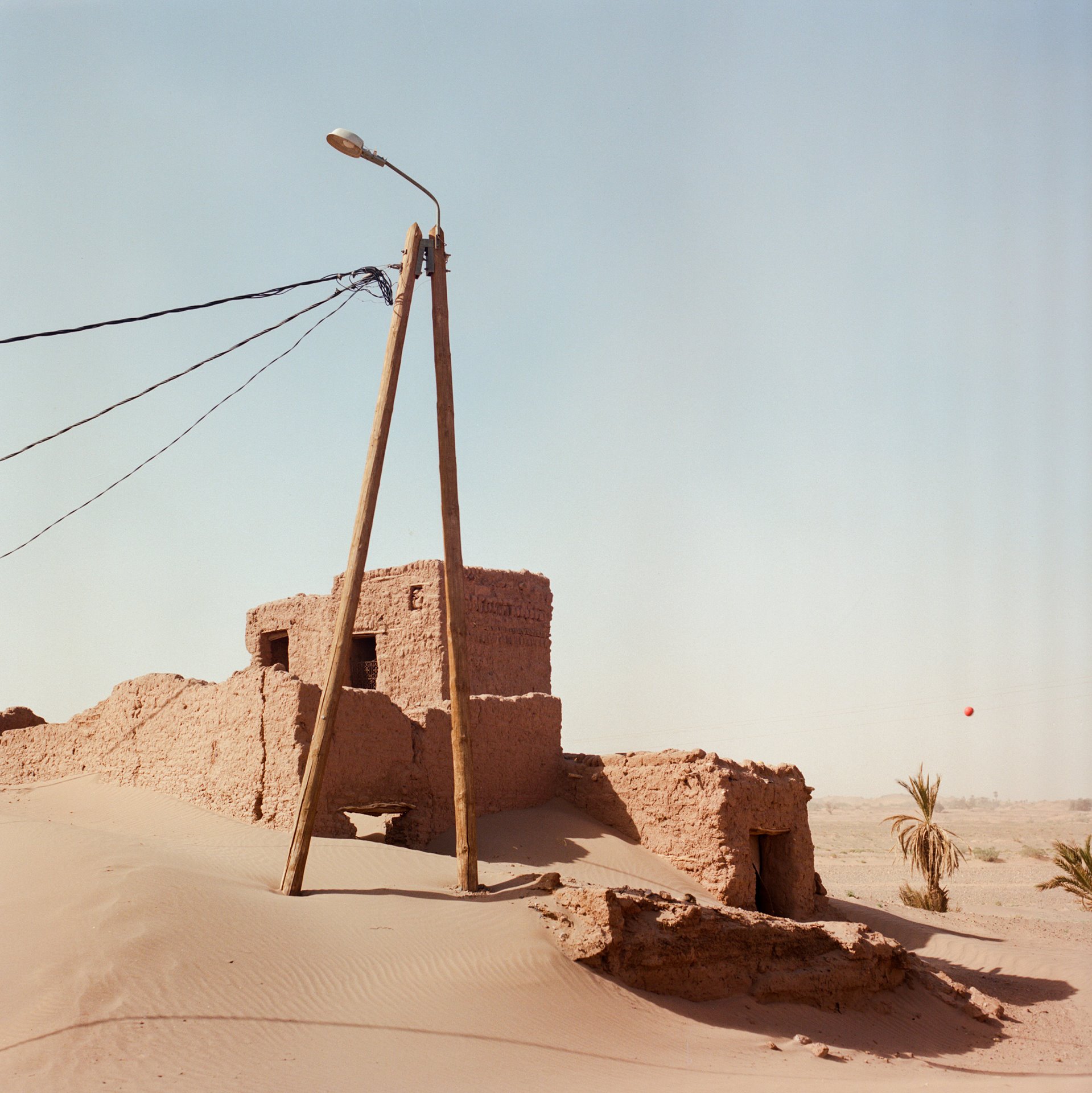 The desert encroaches upon the village of Rgabi Ait Hassou, which is home to around 600 people, near M&#39;hamid El Ghizlane Oasis in southern Morocco.