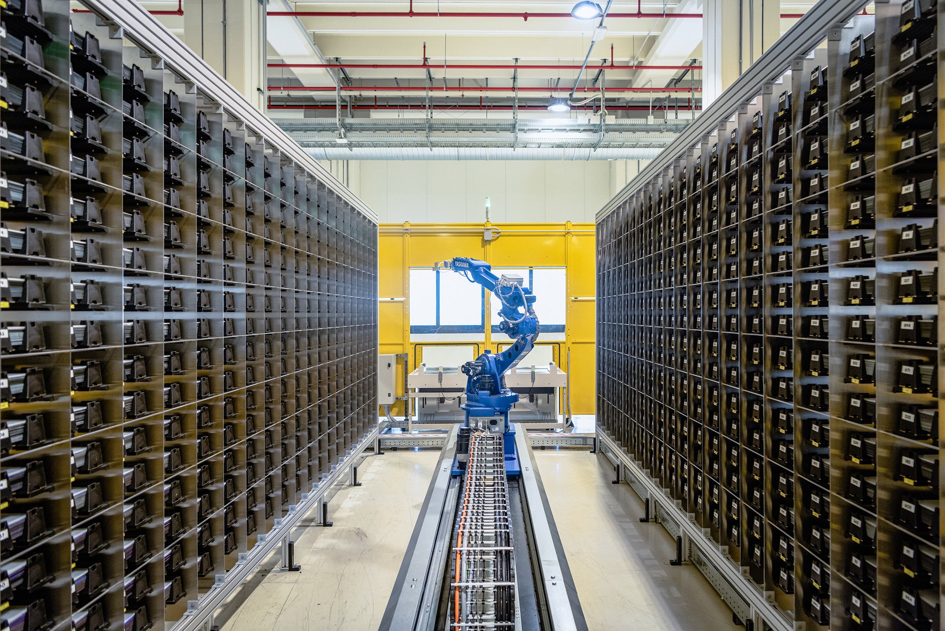 A robotic arm mounts solar cells onto photovoltaic panels, at a &nbsp;&lsquo;gigafactory&rsquo; in Catania, Italy, which was the first in Europe to manufacture photovoltaic panels that produce solar energy from both sides. The plant&rsquo;s operators plan to manufacture sufficient panels each year to generate three gigawatts of energy (a gigawatt is a massive amount of energy, equalling one billion watts).