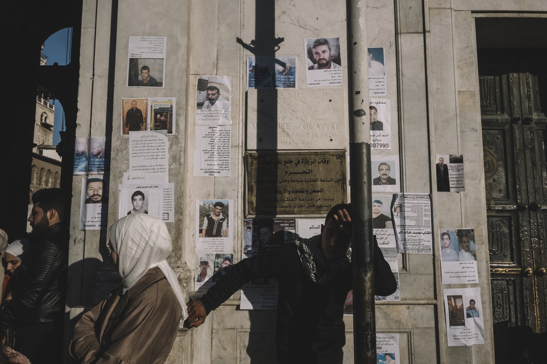 The Umayyad Mosque in Damascus, Syria, is plastered with notes and posters by people searching for missing relatives. Hospitals, prisons, mosques, and streets across the capital bear similar flyers, posted by families who cling to the hope that some passer-by might know where their missing relative is. The prison stood as a grim symbol of the Assad regime&#39;s oppression.<br />
&nbsp;