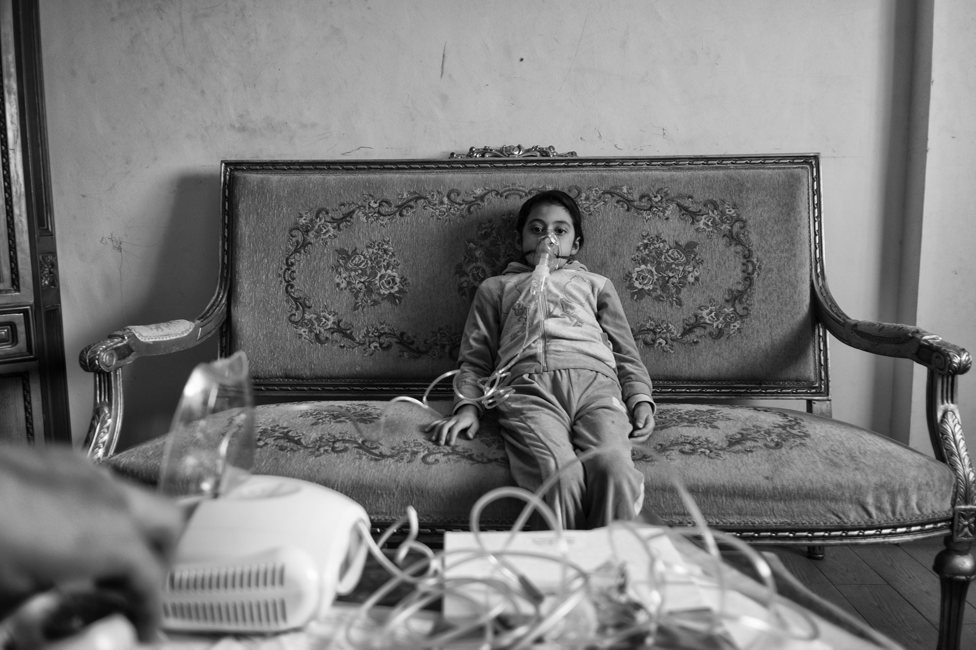 Amal (11) uses a breathing ventilator, which she has relied on since developing asthma as a toddler. Moon Valley, Alexandria, Egypt.