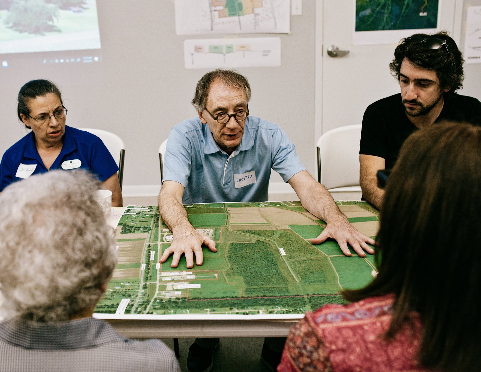 A meeting between community members and architects and landscape gardeners at the fire station in Pointe-aux-Chênes, Louisiana, United States. Planning and construction for the relocation site took six years. This is the first time in the history of the United States that federal authorities have provided financing for a community that has had to move because of climate change.&nbsp;