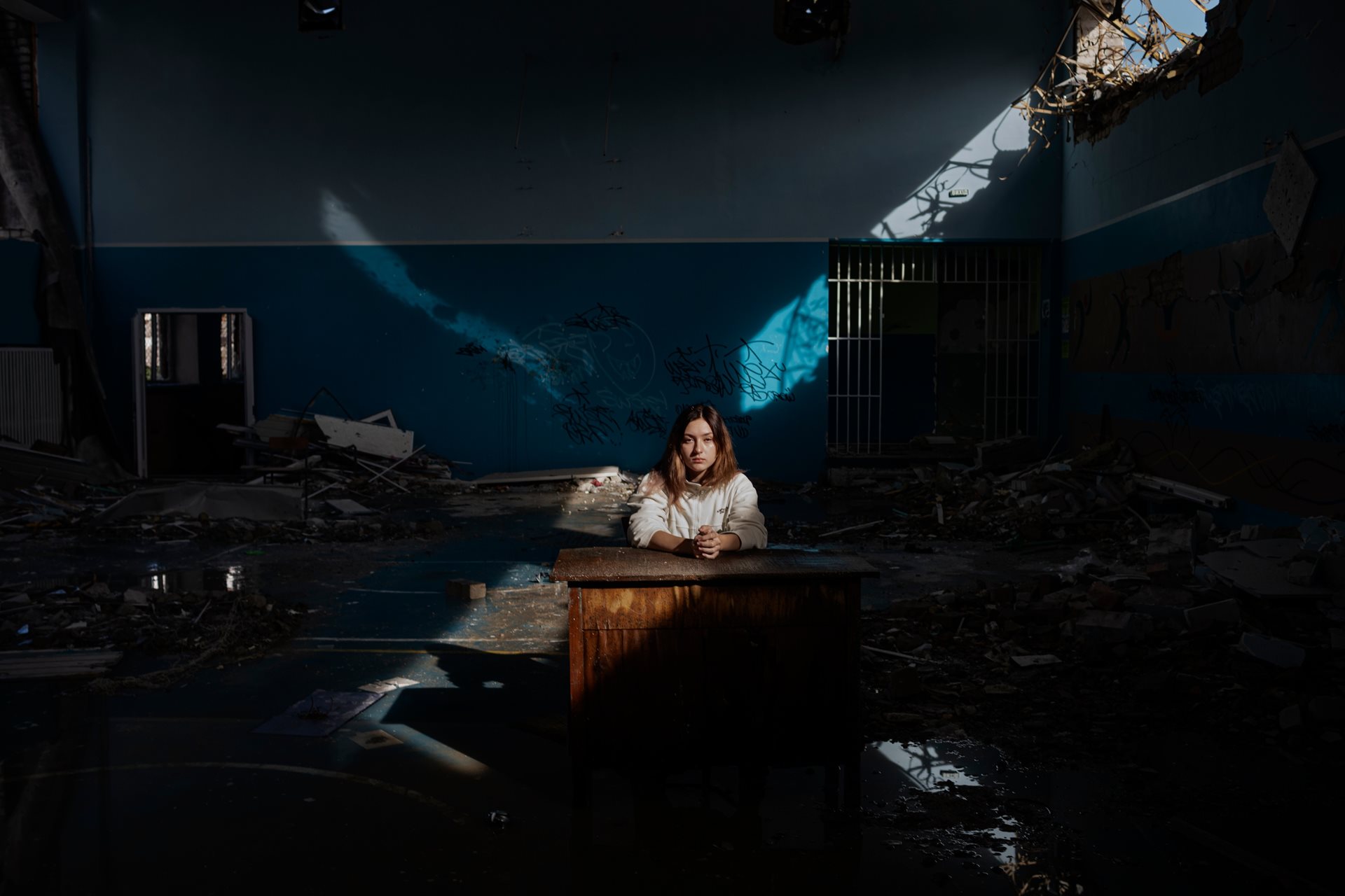 Daria Kechenovska (16) inside her school, Lyceum #25, in Zhytomyr, Ukraine, destroyed by a missile strike. &ldquo;I want to become a soldier to defend my country,&rdquo; she says.
