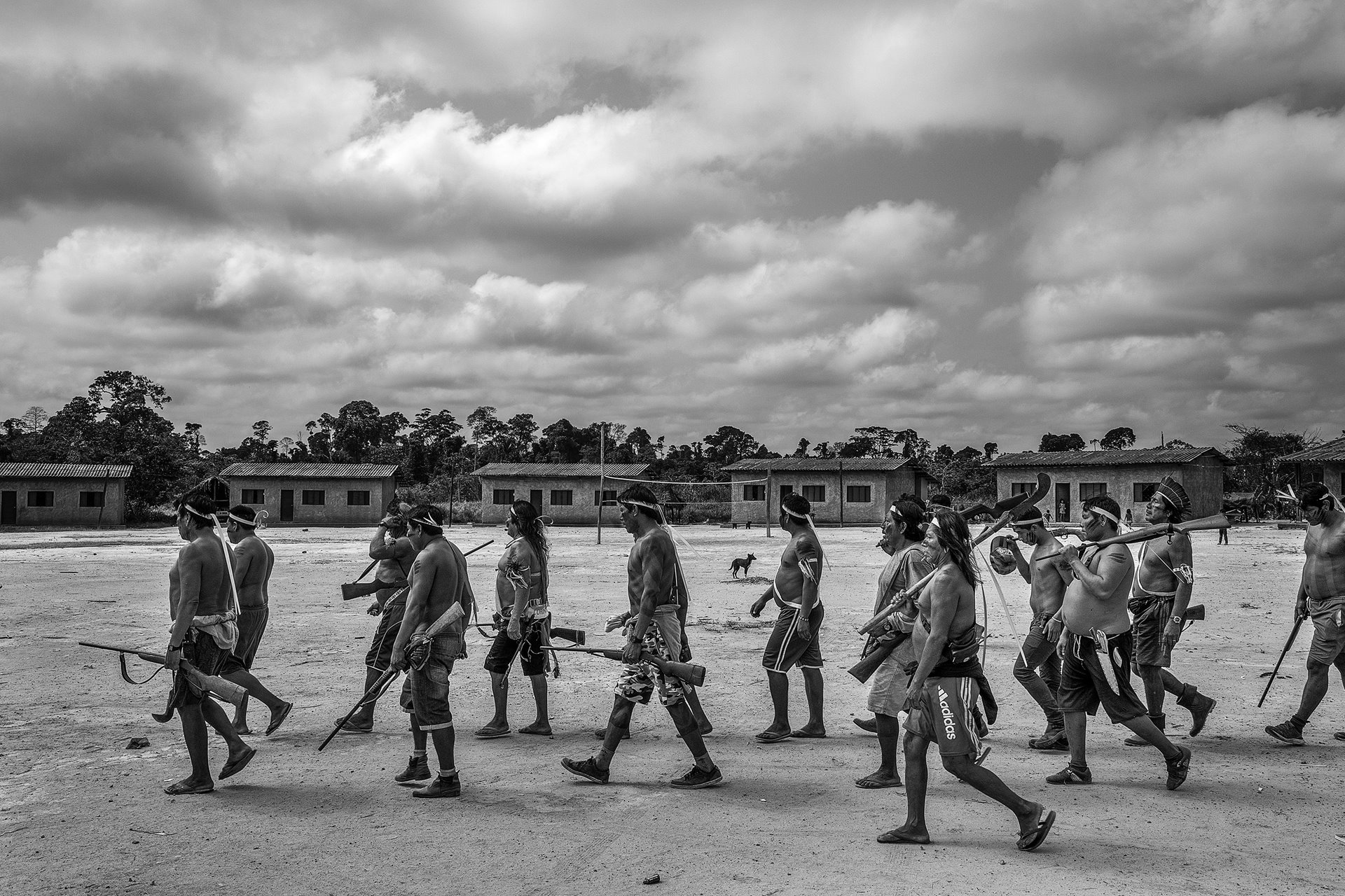 Xikrin warriors arrive at Rapko village, after an expedition to reclaim land that had been invaded and cleared by land-grabbers and illegal ranchers in Trincheira Bacajá Indigenous Land, in Pará, in the Brazilian Amazon. Faced with inaction by government authorities, the Xikrin had organized themselves to defend their territory and fight against deforestation.