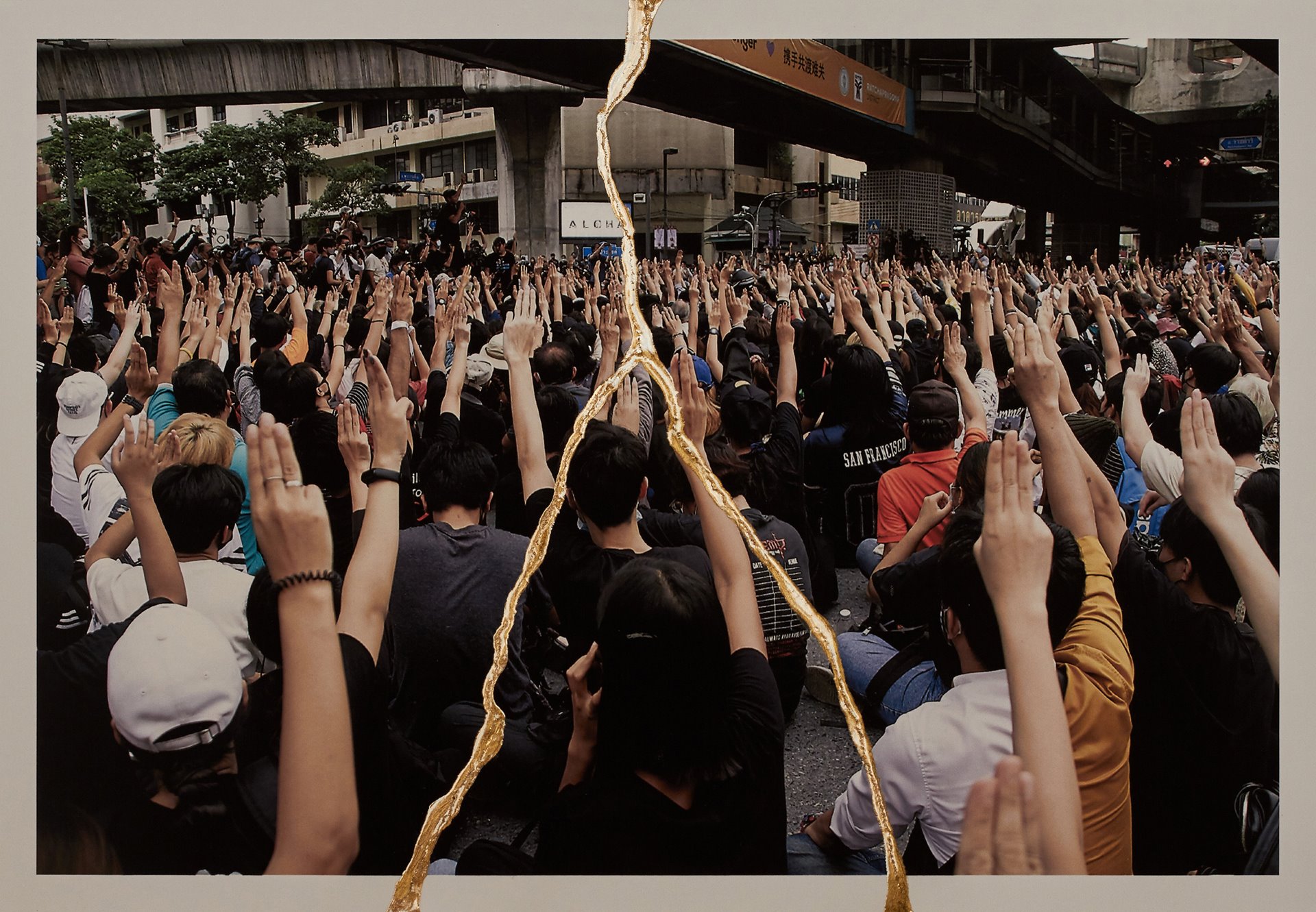 <p>Protesters make a three-finger salute &ndash; popularized by the Hunger Games films &ndash; in Bangkok, Thailand, on 14 October 2020. In the films, the salute is a sign of resistance against the authoritarian regime, which drew comparisons with Thailand&rsquo;s military government. Authorities canceled screenings of the films and arrested people making the salute.</p>
