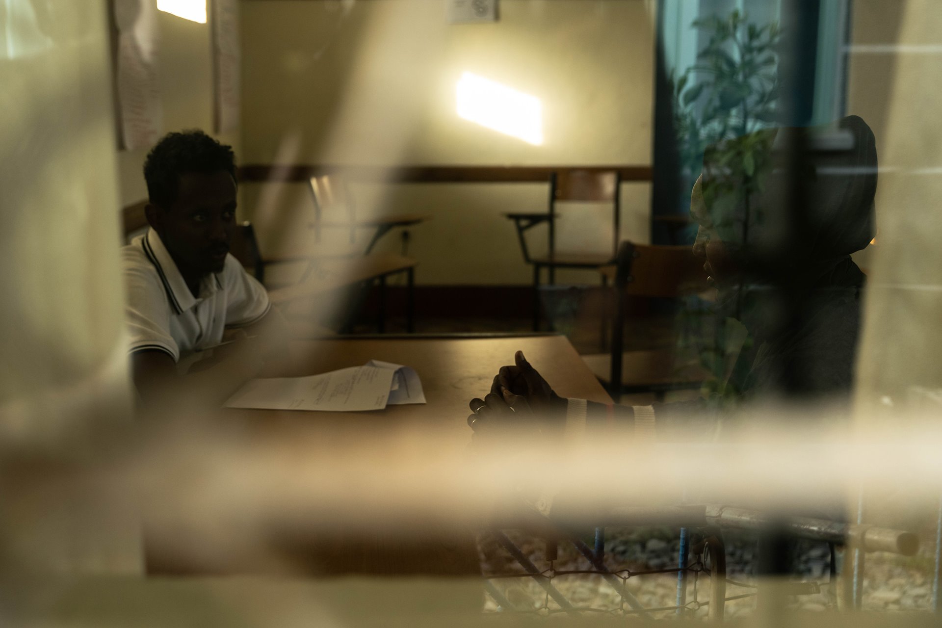 Shila (32) in a counseling session with psychologist Abel Gebreyohannes at the Daughters of Charity center in Mekele, Ethiopia. Since starting counseling, she has been more accepting of her son, who was conceived after months of sexual exploitation during the war.&nbsp;