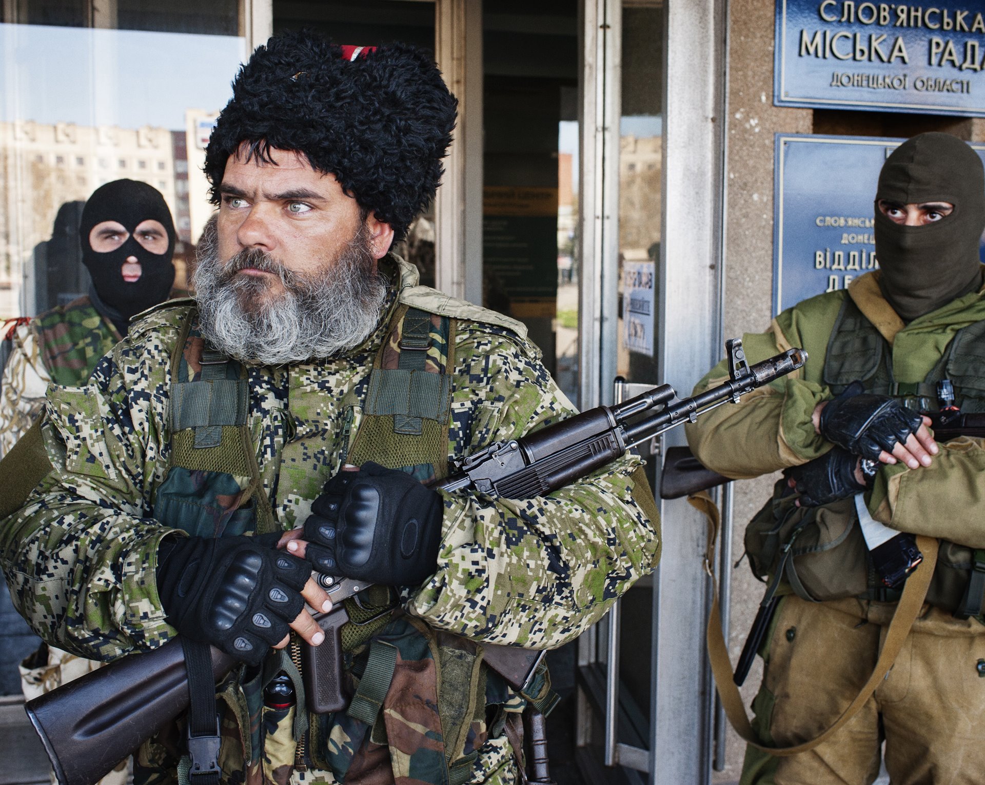 A man stands guard at &nbsp;the entrance to the Slovyansk Town Hall, which had been occupied by separatist forces, in Slovyansk, Ukraine.&nbsp;