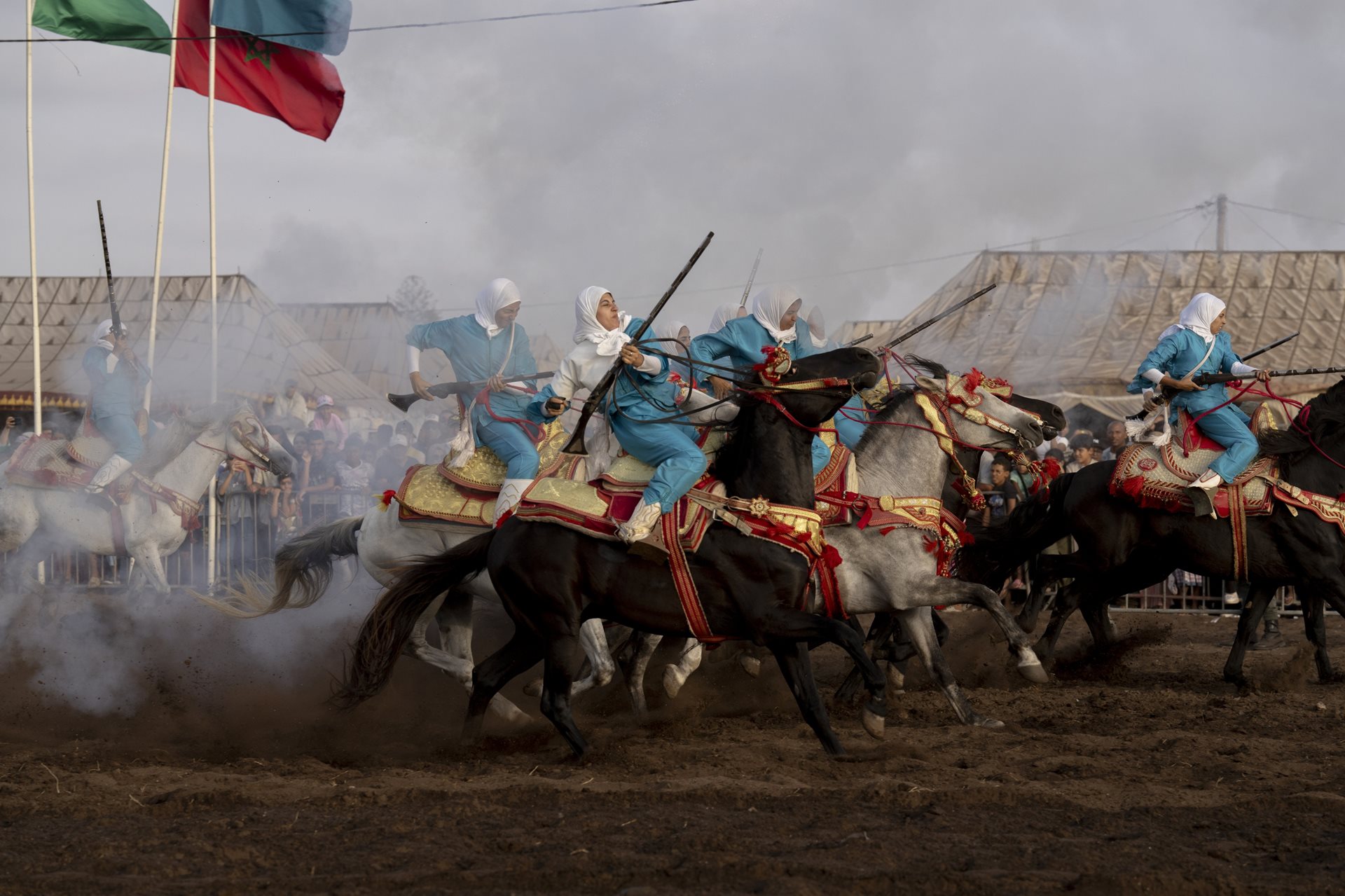 Noura attempts to control her horse after firing, the most dangerous part of the performance. Riders risk injury from gunpowder or falling and being trampled. Sidi Rahal, Morocco.&nbsp;<br />
&nbsp;