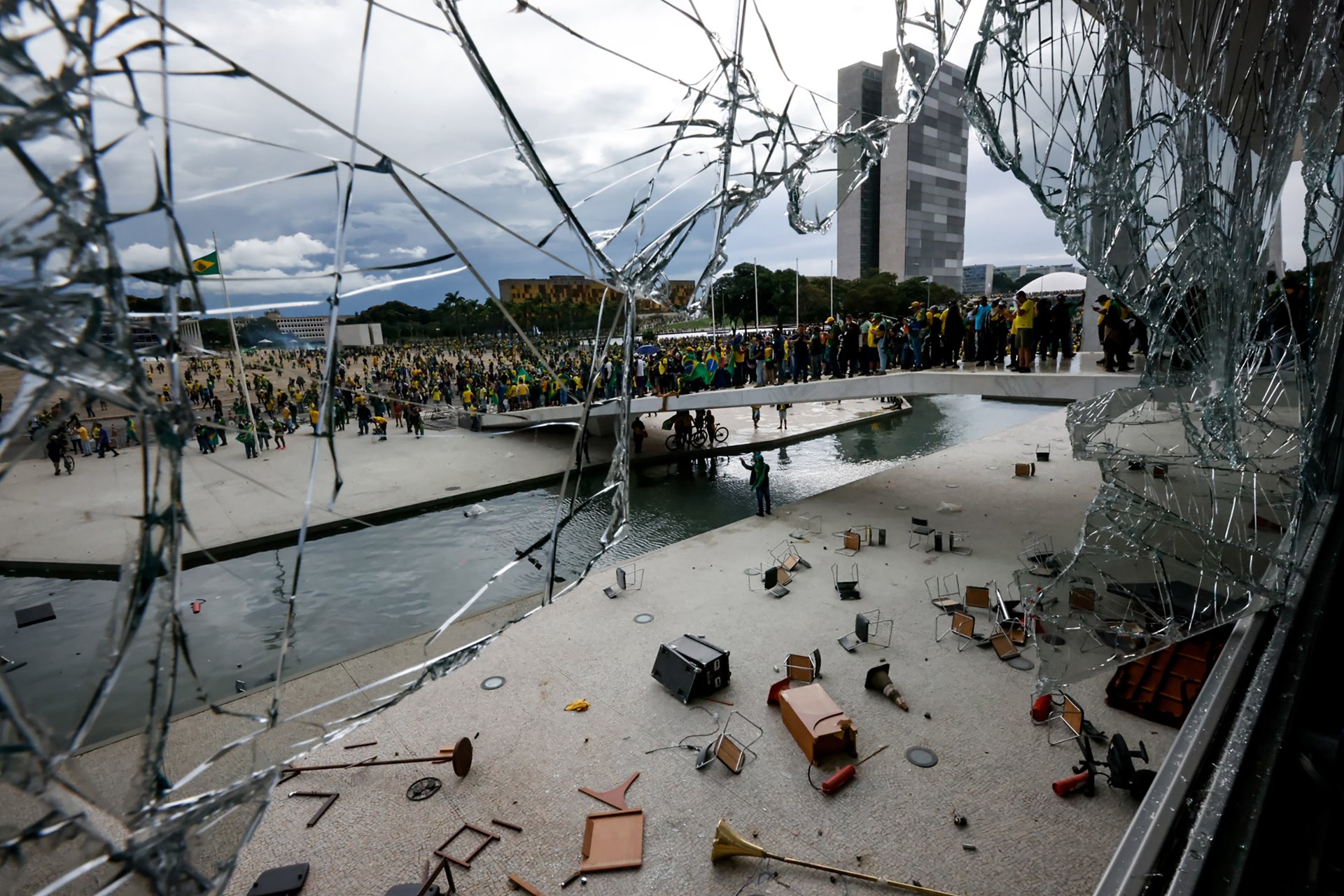 A broken window shown inside the Presidential Palace, in Brasília, Brazil.&nbsp;