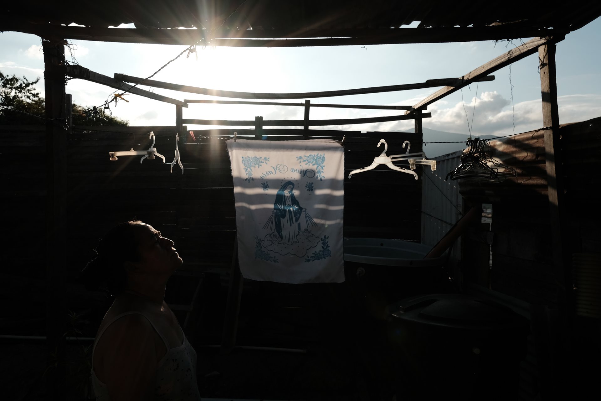 Arcenia (46) prepares for Día de las velitas (Little Candles Day) celebrations in Los Patios, Norte de Santander, Colombia. A single mother, she is solely responsible for her daughter Valeria's upbringing after the father left.&nbsp;