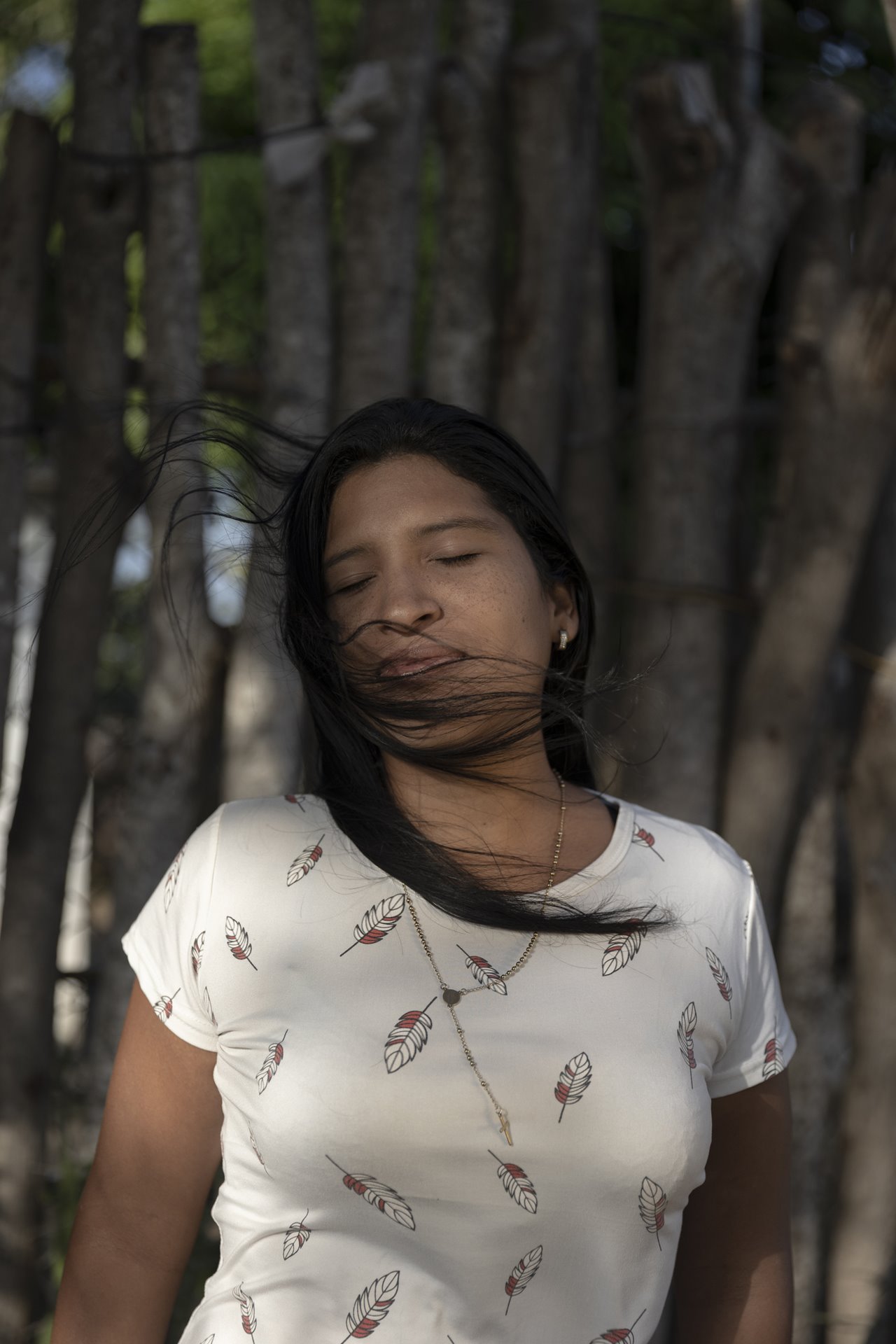 Karelis Rivas (29) poses for a portrait in her home where she lives with her father, in Campo Alegría, an oil community in Zulia State, Venezuela. They still live in a house belonging to national oil company PDVSA. Karelis&rsquo; father was one of the 18,000 oil workers fired after strikes in 2002, even though he did not participate. Once a symbol of prosperity, Campo Alegría now experiences lack of basic services and decaying infrastructure.&nbsp;